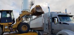 Guano Sulphur Gold granular organic fertiliser being loaded into B-Doubles for delivery to Victoria.